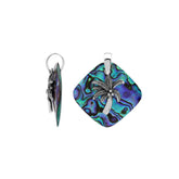 Statement palm tree pendant in sterling silver with abalone shell diamond backdrop, artisan-crafted for bold tropical style.